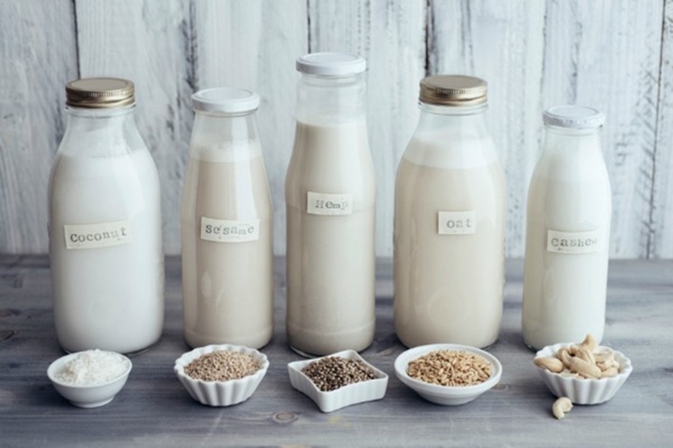 Växtbaserad mjölk vegan alternativ kokosmjölk cashewmjölk