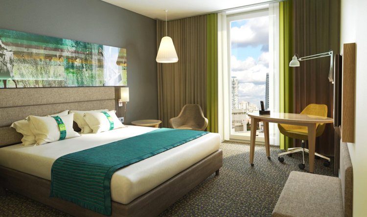 förstklassiga rumskoncept-hotellsvit-grå-väggfärg-väggmålning-beige-stoppad säng-smaragdgrön-accenter-mattor
