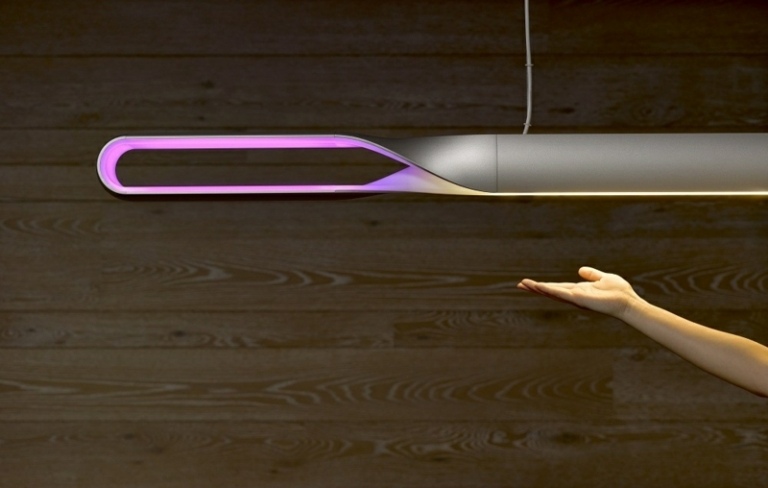 modern hängande lampa rosa ljus handdesign