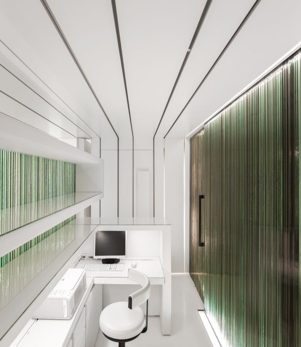 inredning design tandläkare kontor mottagning ljus glas grönt