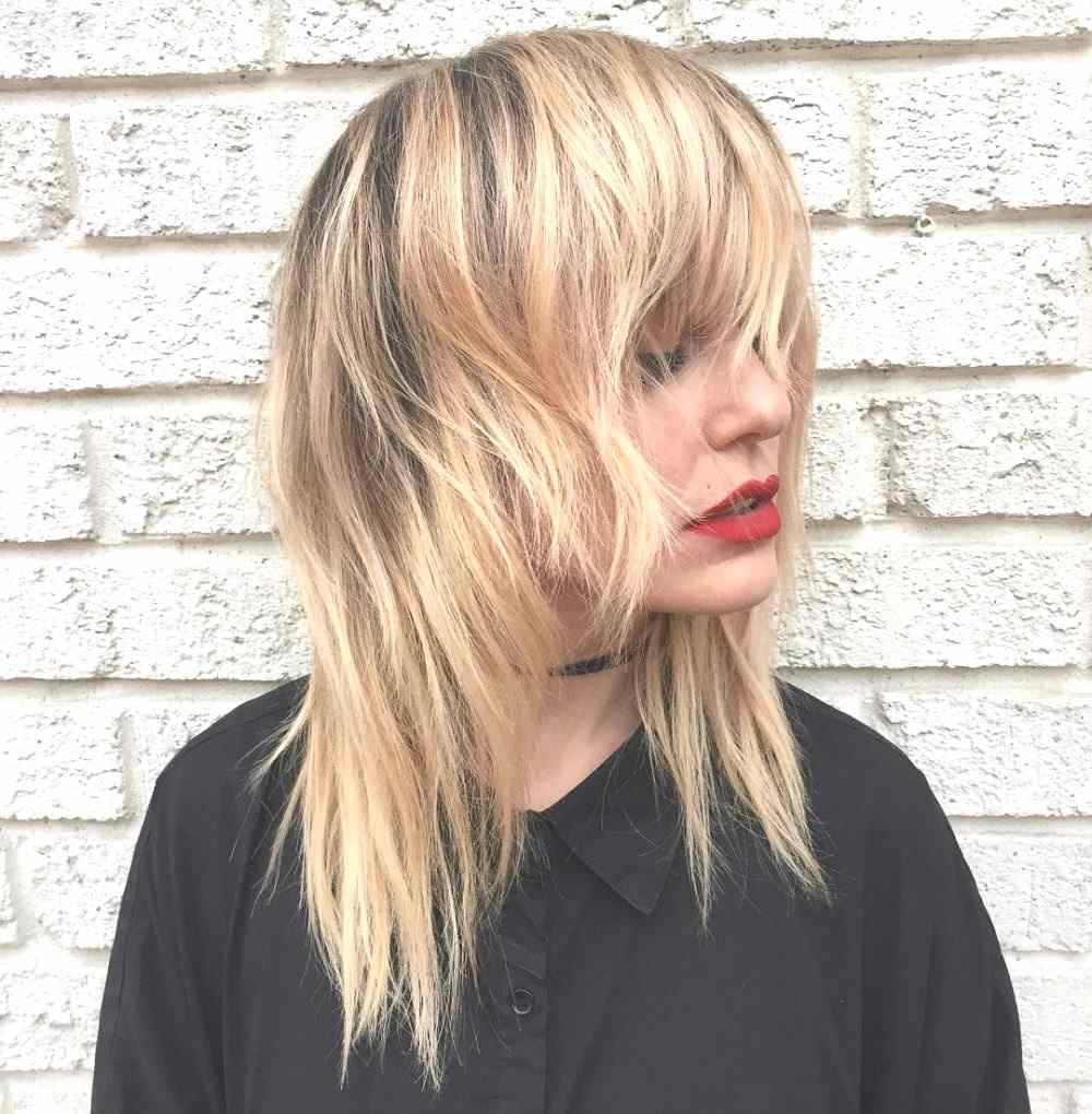 Shag frisyr punk rock stil blond