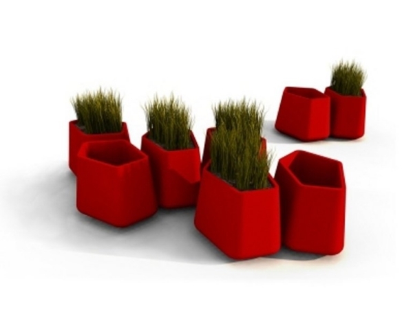 trädgårdsdesign planters i röd plastform asymmetrisk