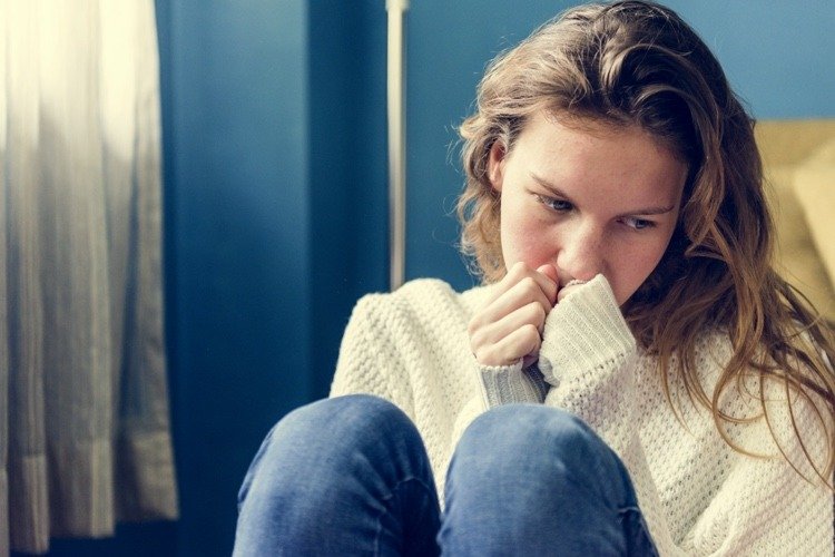 Sakrala chakra blockerade symptom inkluderar depression och rädsla för förändring