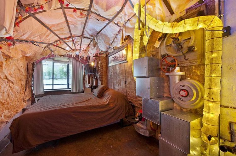 steampunk-interiör-surrealistisk-design-sovrum-gul-belysning
