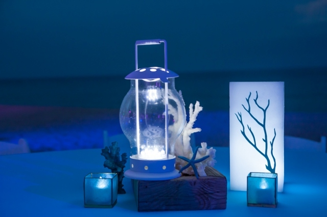 lykta korall pil strandbord dekorationer ljus blå