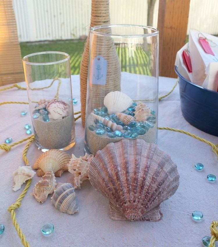 strandbord dekoration lyktor-sand-sten-skal