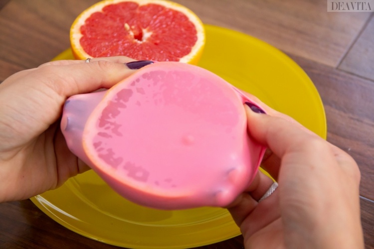 ballongliv hackar hålla skivad frukt täcker halvor av blod apelsin
