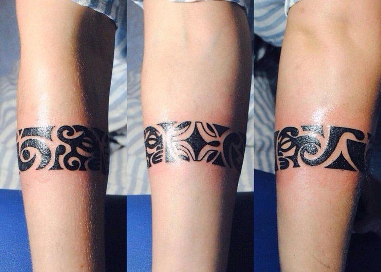 Maori tatuering kvinna arm armband tiki symboler mening