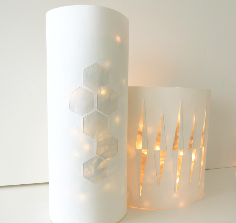 DIY belysning jul minimalistiska lyktor vitt papper honungskaka mönster