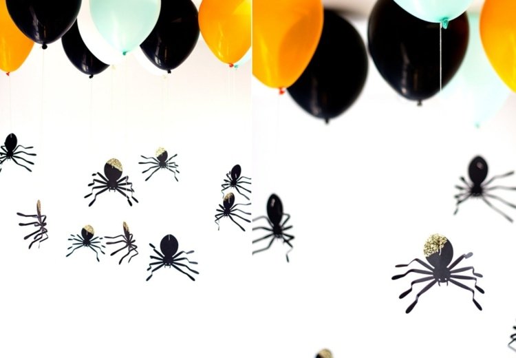 Halloween bakgrund med pappersspindlar och ballonger med helium