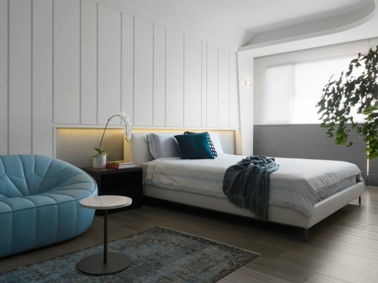 golv-marmorplattor-sovrum-säng-krukväxt-soffa-läder-blå-bord-orkidé-matta-fönster-parkett-golv-17
