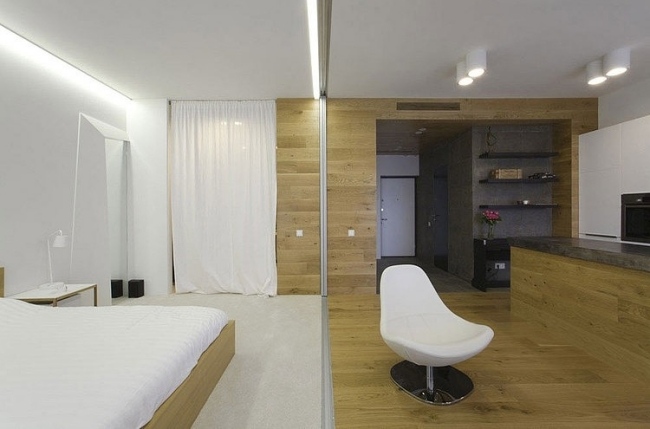 ett rum liten lägenhet sovrum kök skjutdörrar