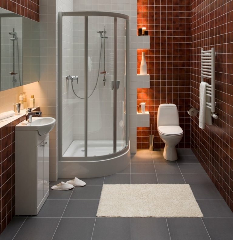 badrum liten kakel mosaik stil brun hörn dusch mini handfat belysning
