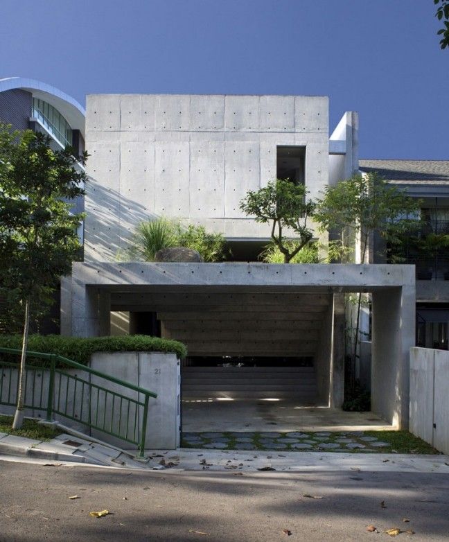modernt flerfamiljshus utsatt betongfasad gatuvy