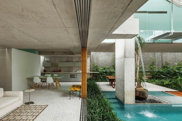 modernt hus brazil pool vatten funktioner i trädgården vardagsrum kök vit bänk