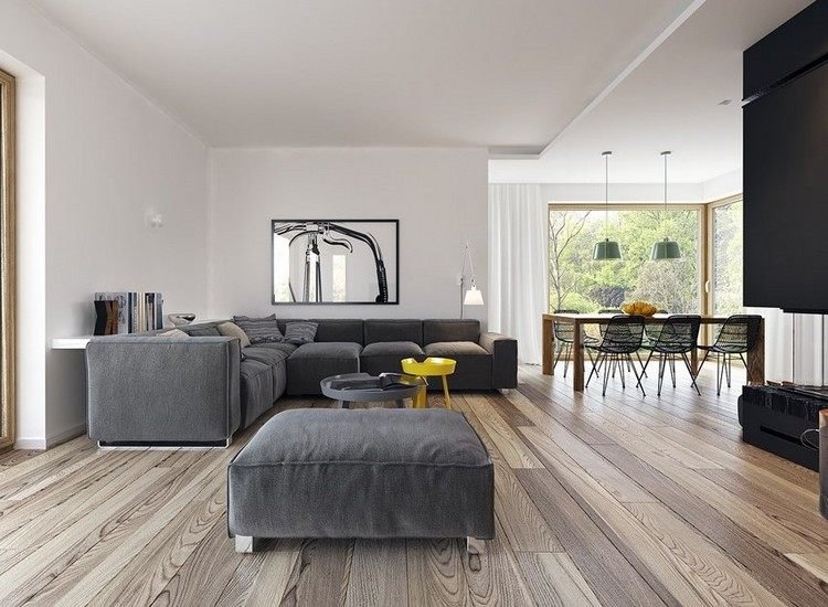modernt vardagsrum soffa-grå-planka-golv-vita-vägg-sidobord