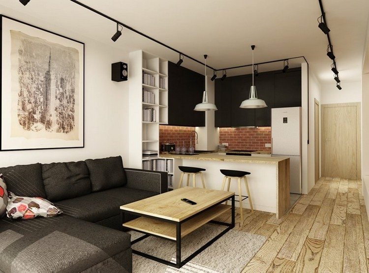 modernt vardagsrum soffa-svart-trägolv-kök-halvön