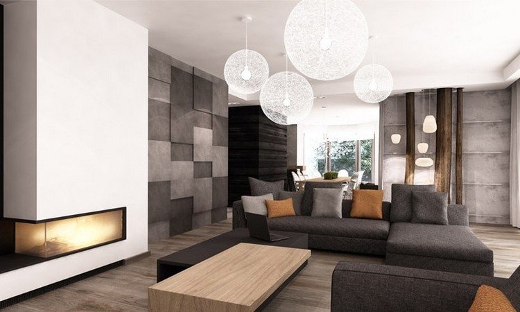 modernt vardagsrum-soffa-grått trägolv-öppen spis vägg-orange-kuddar