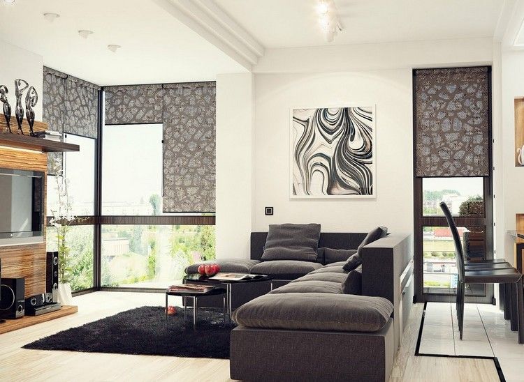 modernt vardagsrum-soffa-mörkgrå-svart-matta-ljus-laminatgolv