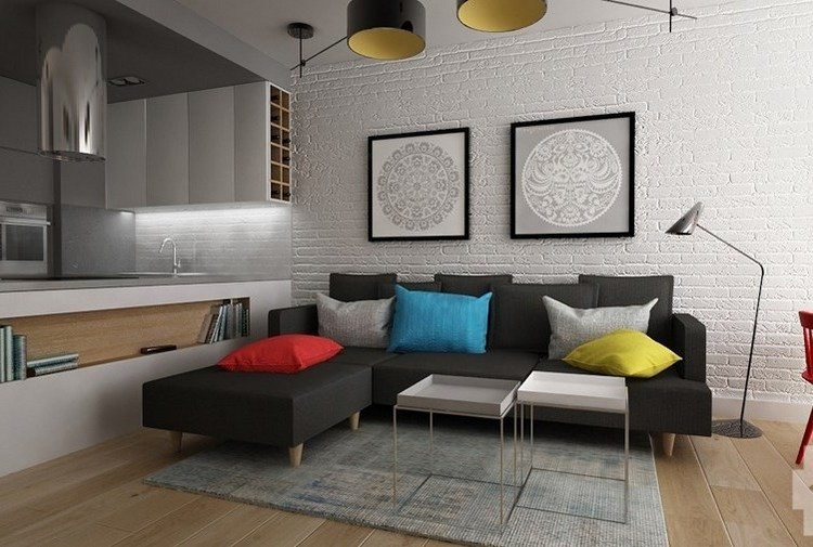 modernt vardagsrum-soffa-mörk-grå-ljusare-trä-golv-vita-sidobord-tegelvägg
