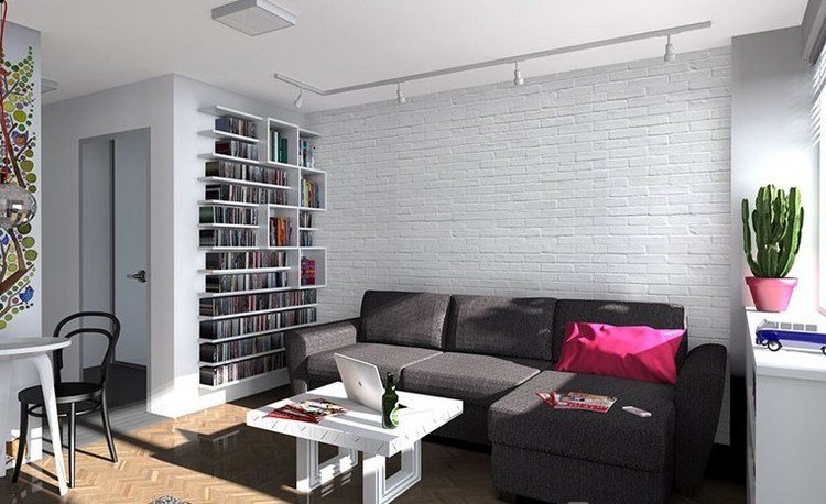 modernt vardagsrum-soffa-antracit-vit-tegel-vägg-parkettgolv