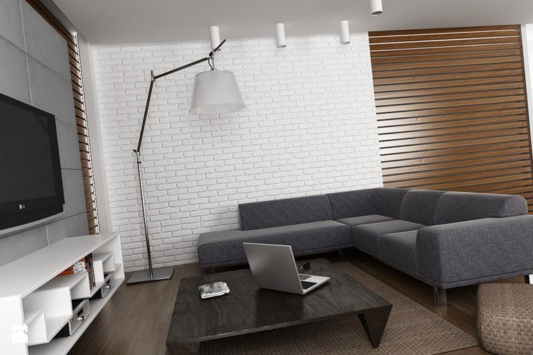 modernt-vardagsrum-hörn-soffa-grå-mörk-trä-golv-vit-tegel-vägg