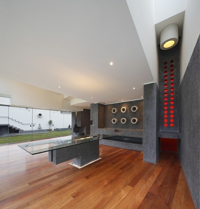 modernt bostadshus peru inredning planke golv svart sten