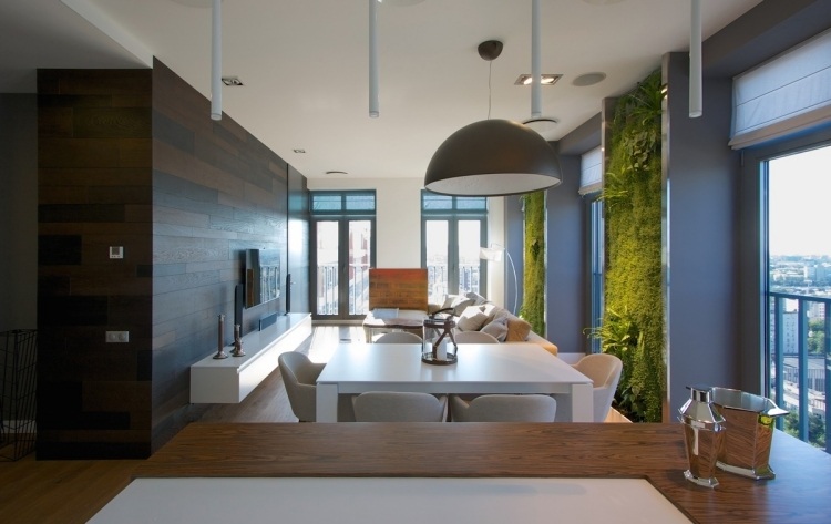 vertikal-trädgård-öppen-planering-soffa-matbord-grädde-vit-vägg-design-skänk-svart-mörk-brun-loft