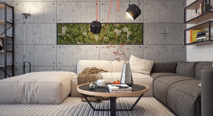 vertikal-trädgård-vardagsrum-industriell-stil-soffor-grå-moduler-soffbord-runda spotlights-betongvägg