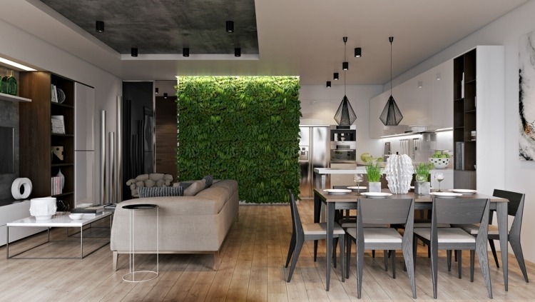 vertikal-trädgård-vardagsrum-kök-öppet-bateon-industri-design-hängande-lampor-matbord-soffa