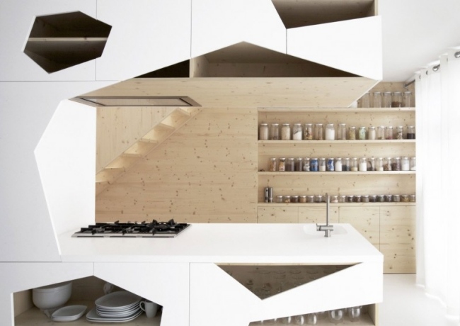 modern lägenhet i29 arkitekter kök vit furu träpanel