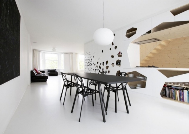modern lägenhet svart matsal möbler laserskurna fronter