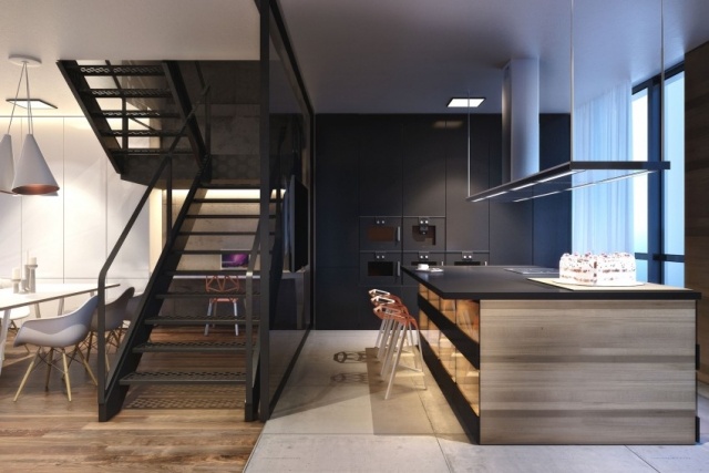 öppet kök-vardagsrum trä betonggolv svart metall trappor