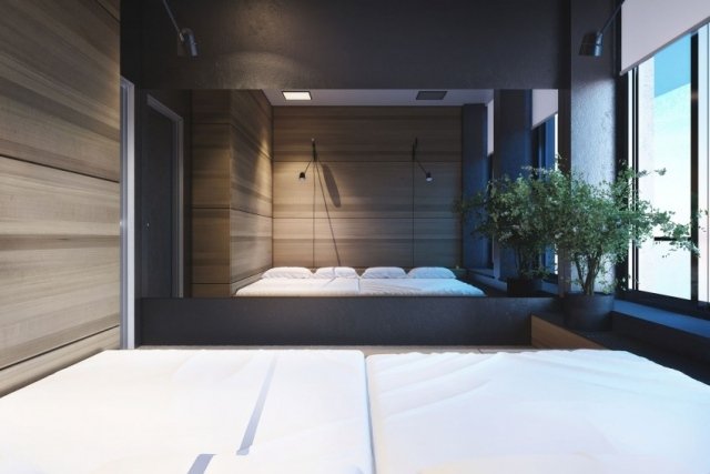 små sovrum sängar trä väggbeklädnad optiskt förstora väggspegeln