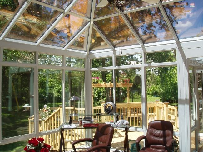 bygga vinterträdgård fullt glas njuta av solens hemmakontor