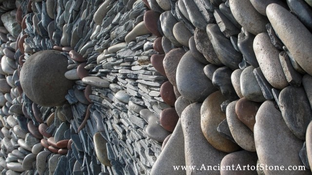 virvlad-mosaik-abstrakt-konst-gjord-av-sten-som-ett designmedel