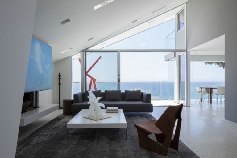 Vardagsrumsmöbler - vit - havsutsikt - matta - mörkgrå - soffa - soffbord - högglans - vit - stol - plywood