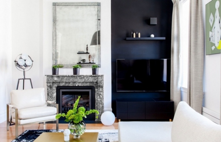 Möbler för vardagsrummet -vit-soffa-fåtölj-öppen spis-marmor-tv vägg-svart