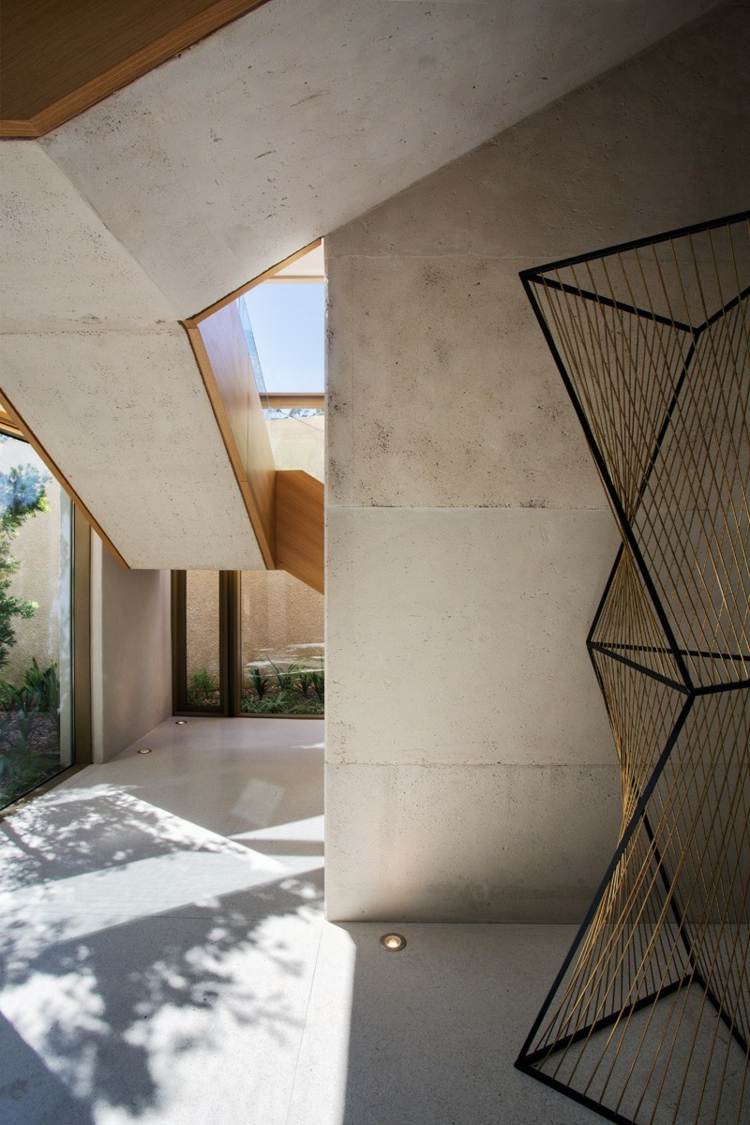 minimalistisk stil möbler betong skulptur metall golv modern