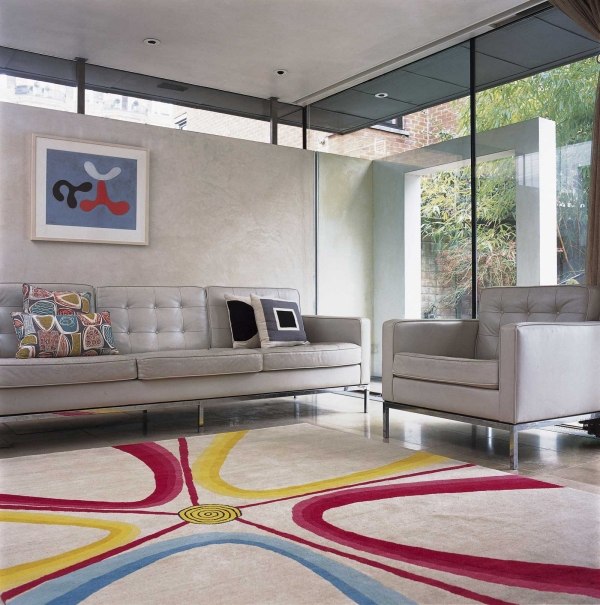 moderna mattor med mönster färg accenter lägga grå vardagsrum design