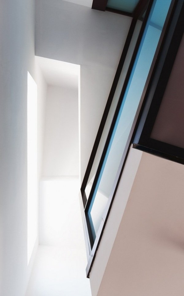 bifogad parhus med asymmetrisk fasad minimalistisk