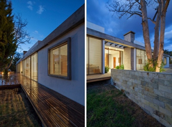 modernt hus stenmur trädgård minimalistisk arkitektur