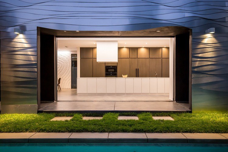 unik-hus-design-våg-fasad-kök-vit-minimalistisk