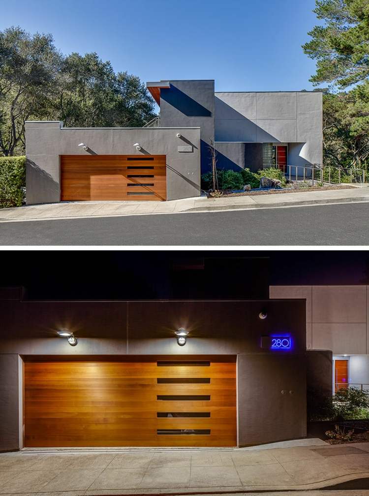 elektrisk-garageport-mönster-glas-remsor-lampor-betong-grå-fasad