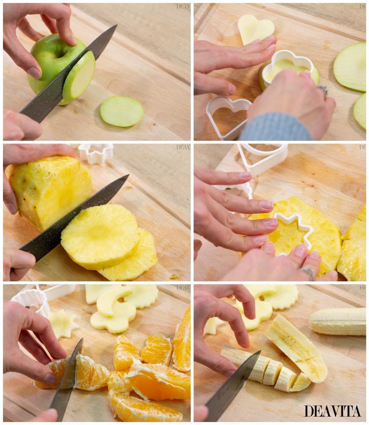 Fingermat till barnkalas kalla fruktspett från ananasbanan och apelsiner