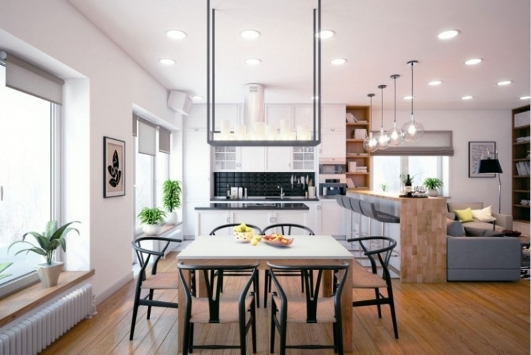 matsal-möbler-trägolv-matbord-fyrkantiga-stolar-svart-flätade-fläckar-hängande lamp-ljus