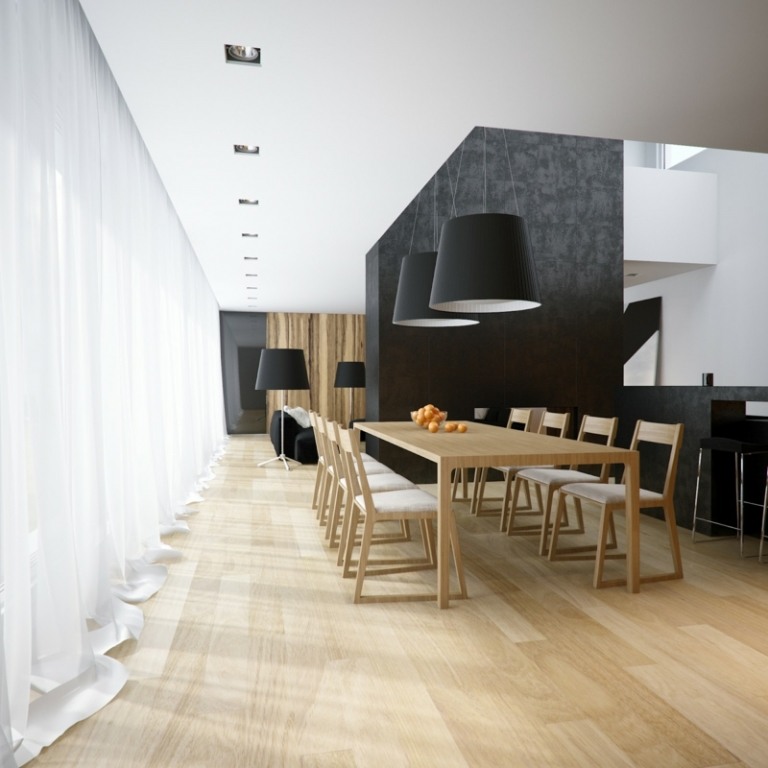 matsal modern inredning minimalism grå accent vägg ljus trämöbler