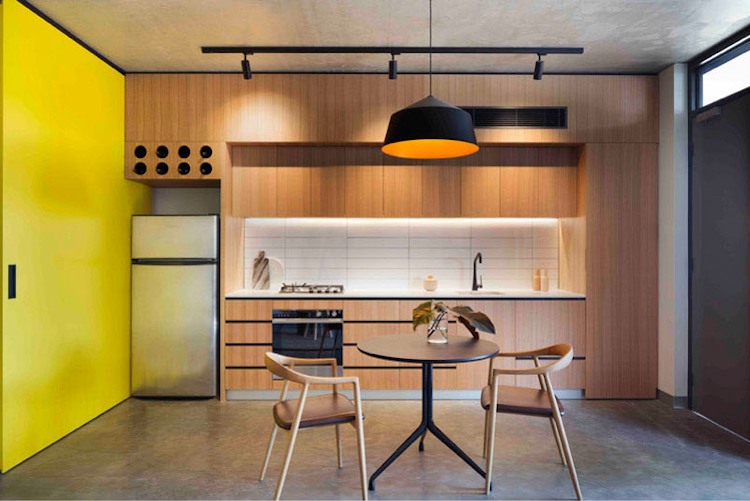 exklusivt-levande-flerfamiljshus-kök-vardags-funktionellt-betong-golv-modernt-betong