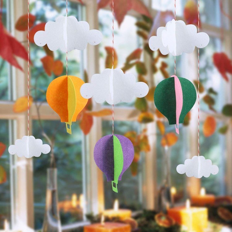 Hantverkskarnevalfönsterballonger skurna ur kartongidé för karnevalsfönsterdekoration