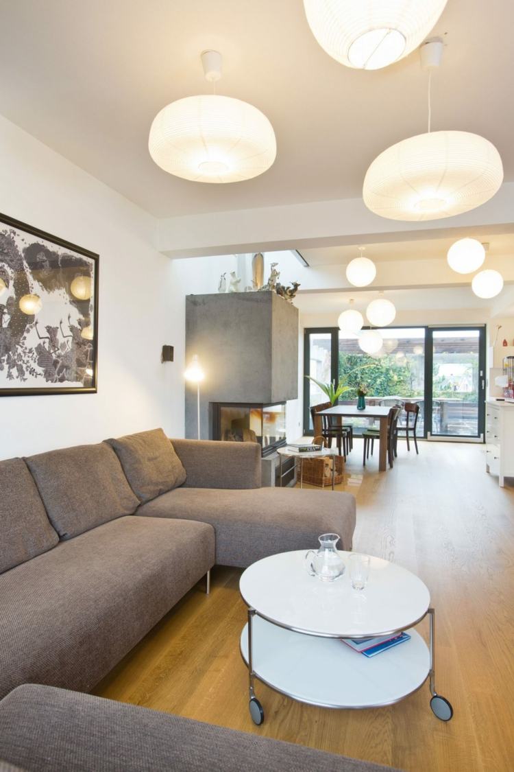 fasad-design-vardagsrum-lounge-soffa-grå-rund-soffbord